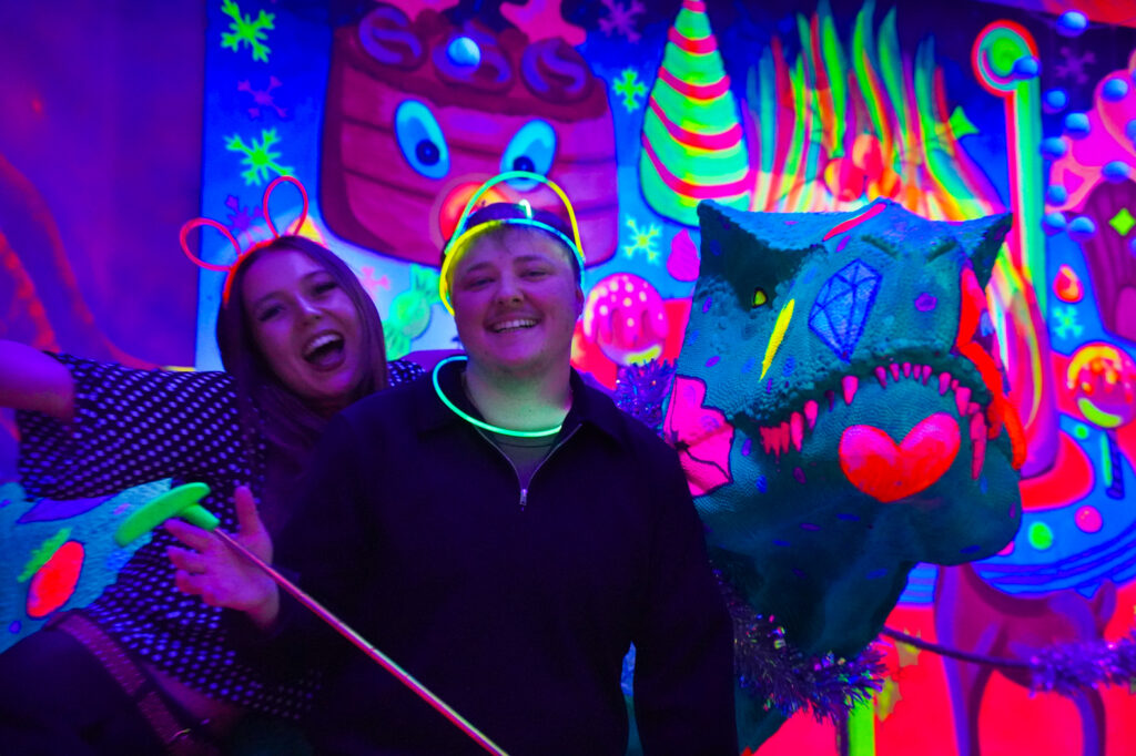 Date Night couple playing mini golf in GLOBALLS Brighton